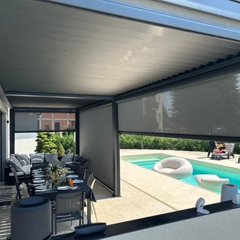 Motorized roller shades with remote control in North Atlanta family room