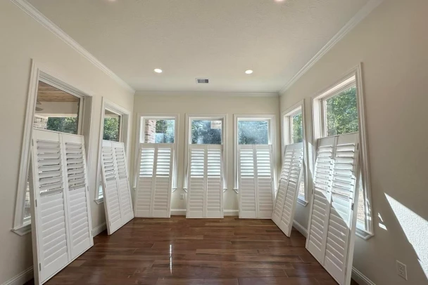 detailed view of plantation shutter construction and hardware